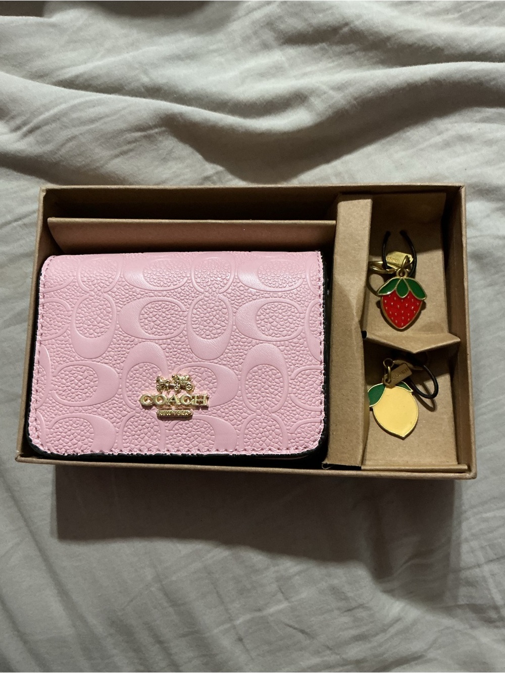 Coach Pink Signature Embossed Card Case with Fruit Charms